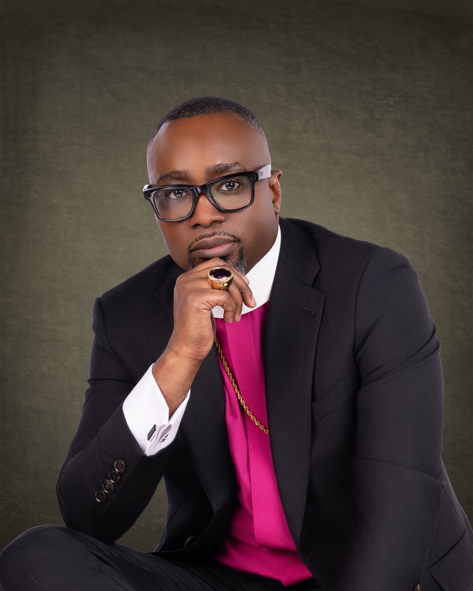 Bishop Dr. Edward Jones, IV, seated in episcopal attire