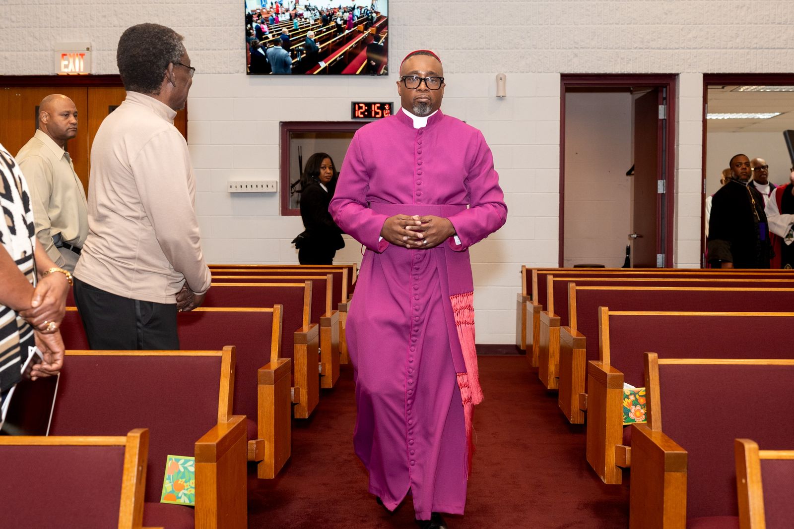 The Bishop-elect in purple processing down the center aisle