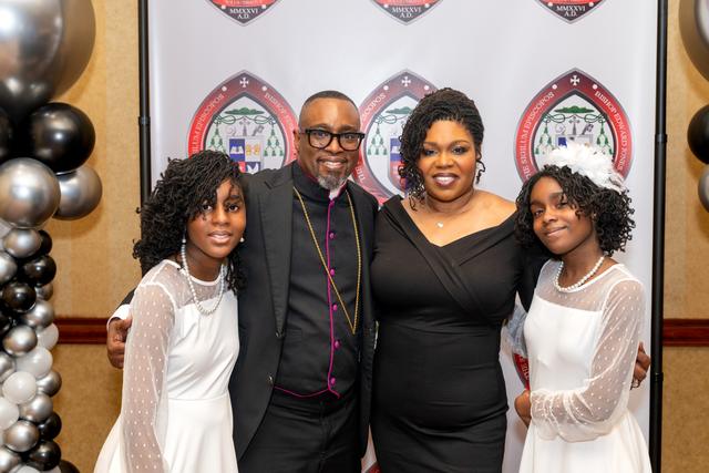 Bishop Jones with his family at the banquet